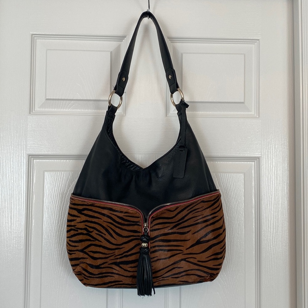 Black leather purse with tiger “fur” trim